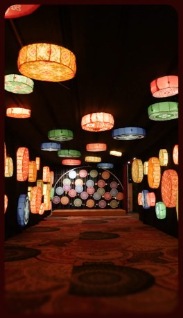 The lantern-lit entrance corridor into the venue